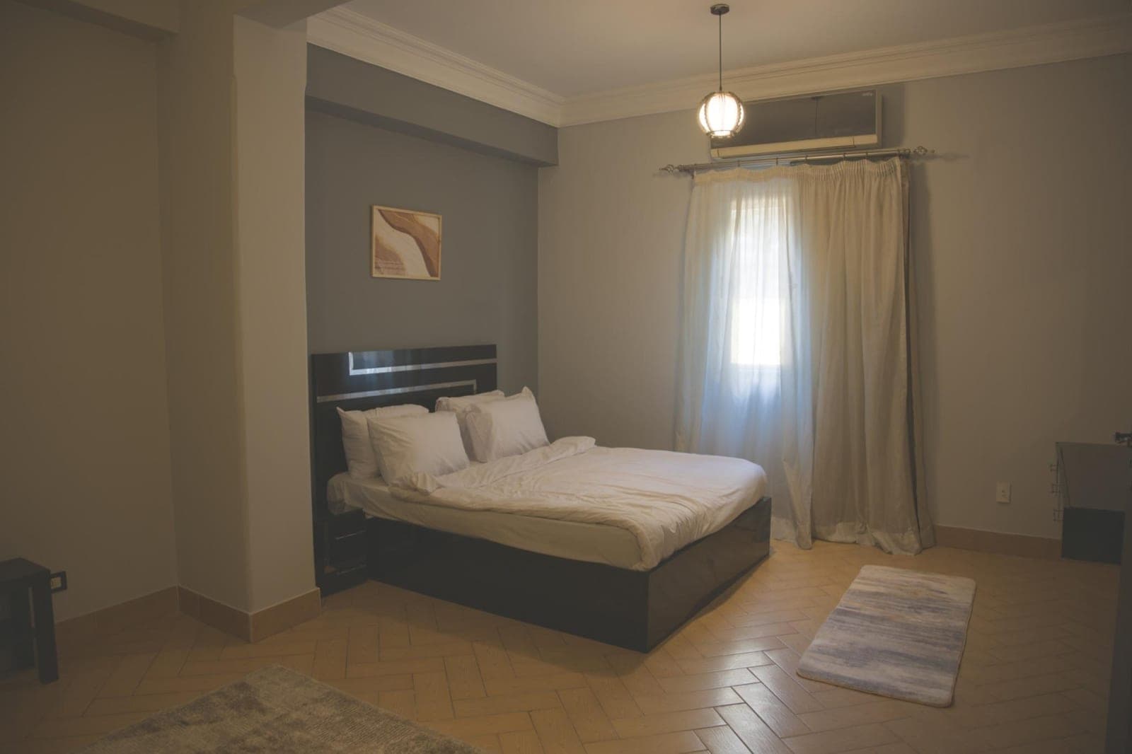 A bedroom in Suite 2, Zamalek Suites