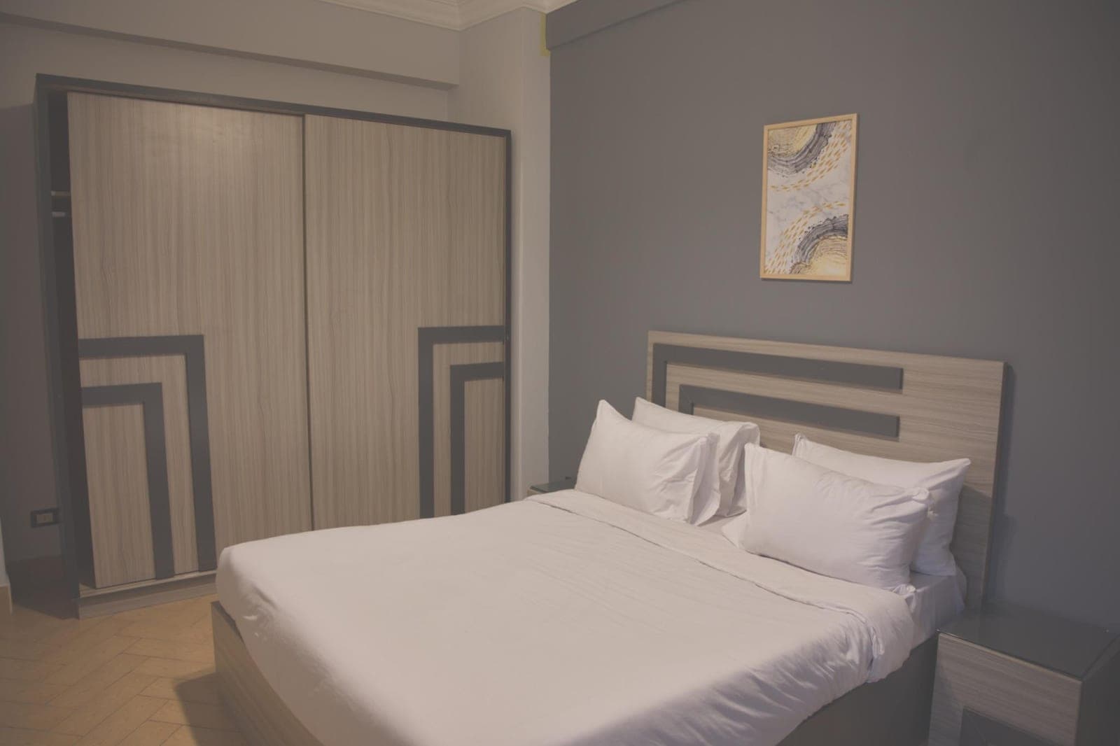 A bedroom in Suite 3, Zamalek Suites
